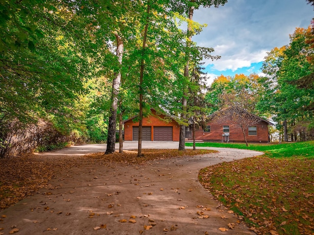 view of home's community featuring a garage