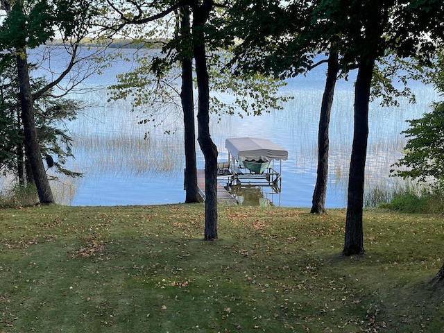 view of water feature with a dock