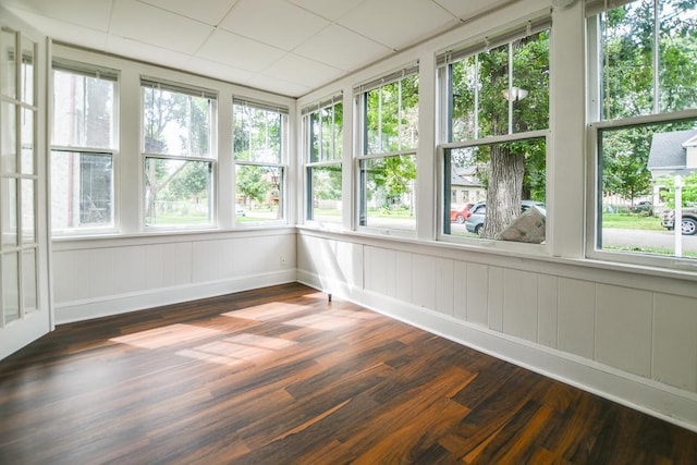 unfurnished sunroom featuring plenty of natural light