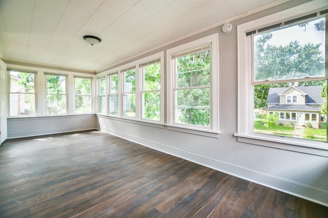 unfurnished sunroom featuring a healthy amount of sunlight