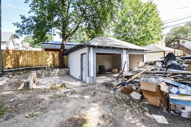 garage with wood walls