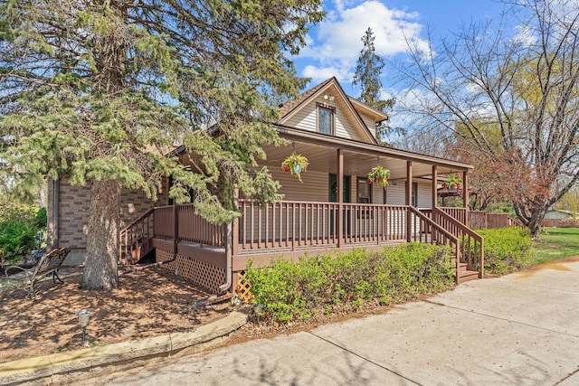 8011 Long Lake Rd, Mounds View, MN 55112 - view of front of home featuring a porch