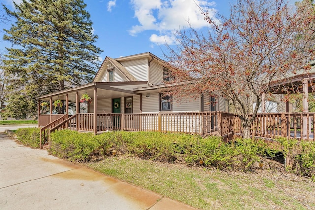 8011 Long Lake Rd, Mounds View, MN 55112 - view of front of home featuring a porch