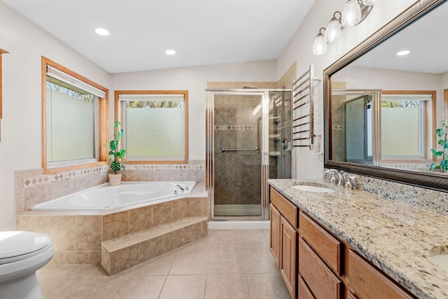8011 Long Lake Rd, Mounds View, MN 55112 - full bathroom featuring vanity, a bath, a stall shower, tile patterned floors, and recessed lighting