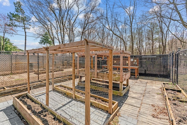 8011 Long Lake Rd, Mounds View, MN 55112 - wooden deck featuring a vegetable garden