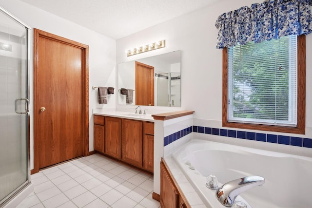 bathroom with vanity, separate shower and tub, and tile patterned floors