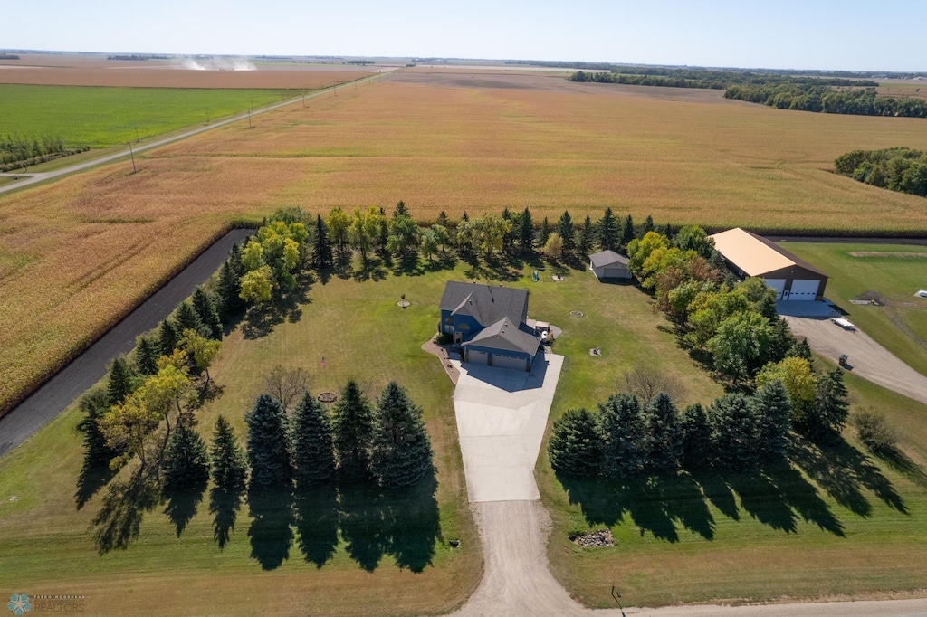 birds eye view of property with a rural view