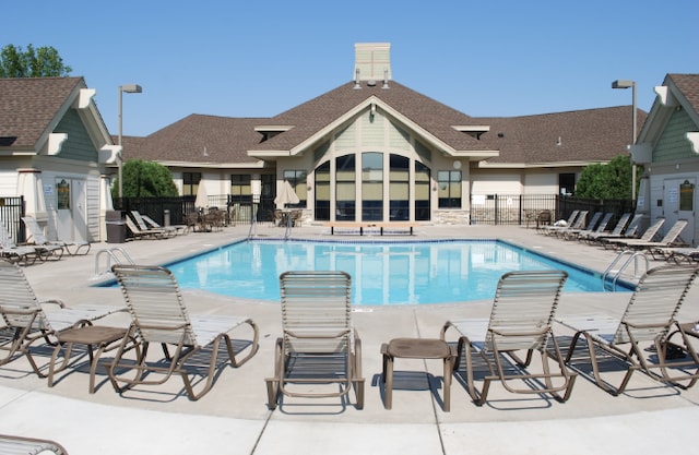 view of swimming pool with a patio area