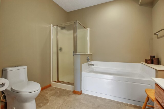 full bathroom with vanity, toilet, tile patterned flooring, and shower with separate bathtub