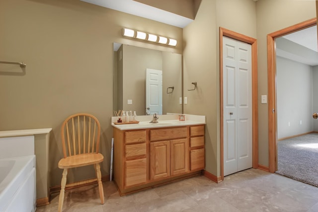 bathroom with vanity and a bathtub