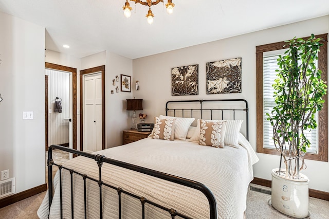 28342 Tiger St NW, Zimmerman, MN 55398 - carpeted bedroom with baseboards and a chandelier