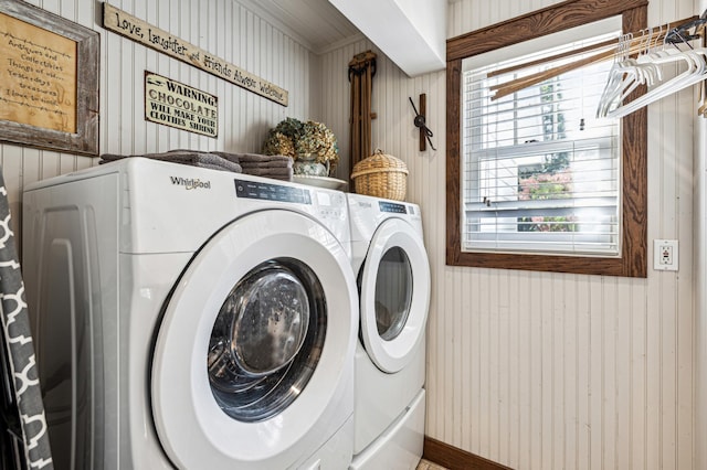 28342 Tiger St NW, Zimmerman, MN 55398 - laundry room with washer and dryer and wood walls
