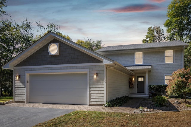 28342 Tiger St NW, Zimmerman, MN 55398 - view of front of home featuring driveway, an attached garage, and a shingled roof