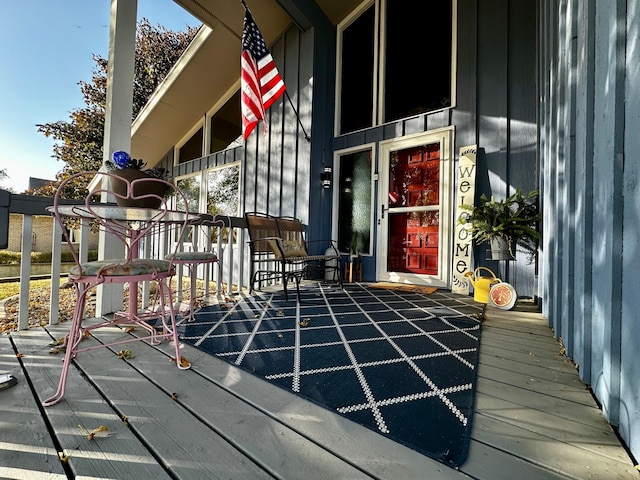 doorway to property with a deck