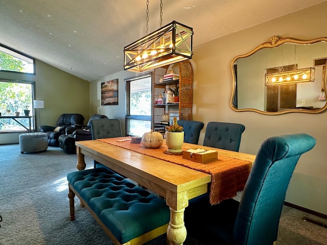 carpeted dining room with lofted ceiling and a textured ceiling