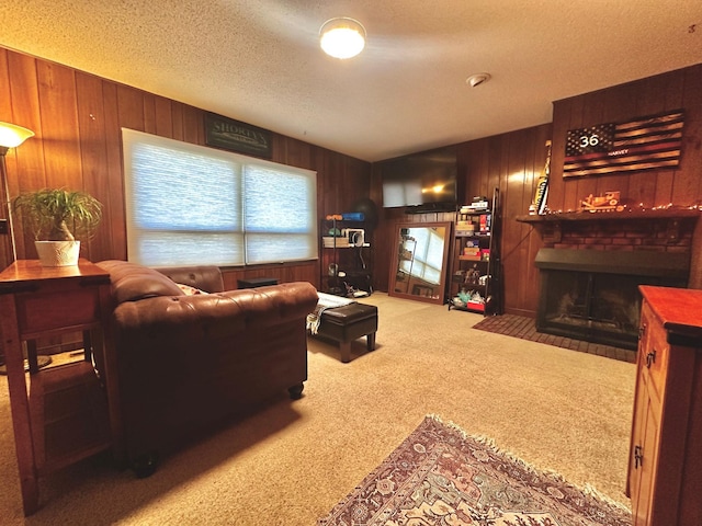 living room featuring carpet, a brick fireplace, and wooden walls