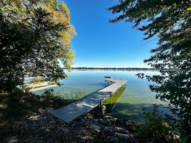 view of dock with a water view