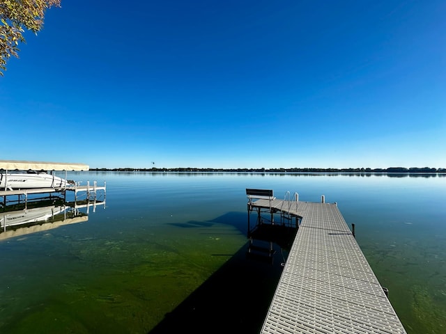 view of dock with a water view