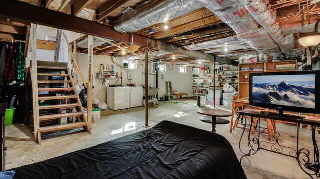 basement with washing machine and dryer