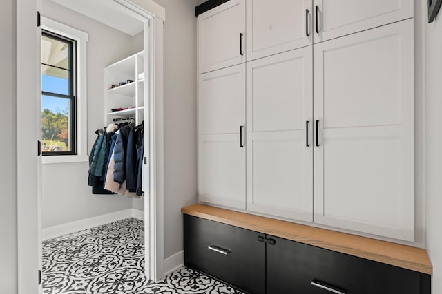 mudroom featuring light tile patterned flooring