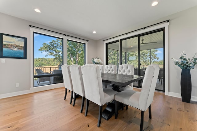 dining area with light wood-type flooring