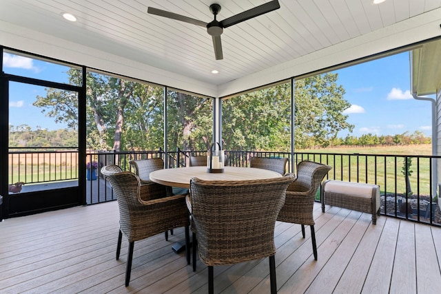 sunroom featuring wood ceiling, a wealth of natural light, and ceiling fan