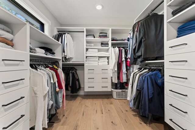 spacious closet with light wood-type flooring