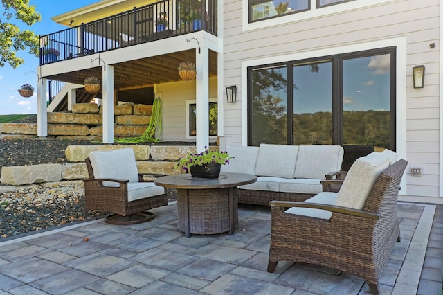 view of patio / terrace with outdoor lounge area and a deck