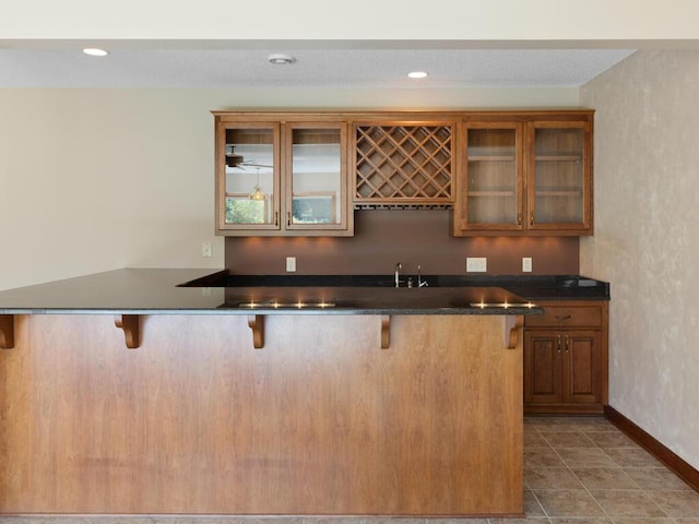 bar with tile patterned floors