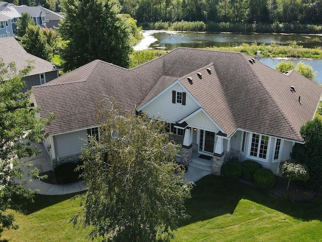 birds eye view of property featuring a water view