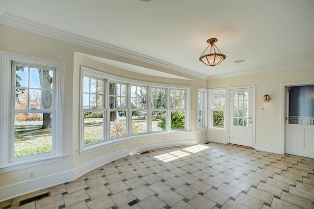 unfurnished sunroom featuring a wealth of natural light