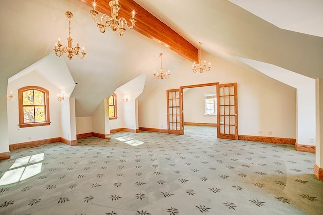 bonus room featuring vaulted ceiling with beams, french doors, and carpet floors