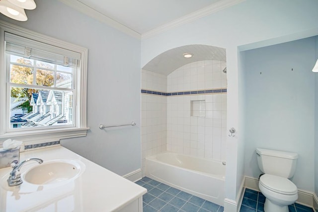 full bathroom featuring ornamental molding, vanity, tile patterned flooring, toilet, and tiled shower / bath