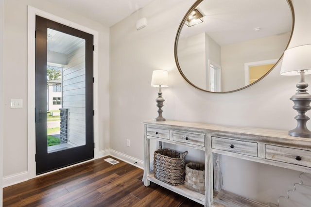 entryway featuring dark wood-type flooring