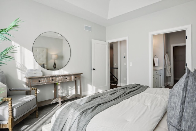 bedroom featuring ensuite bathroom