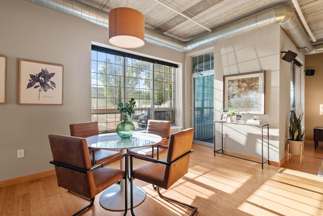 dining room featuring light hardwood / wood-style floors