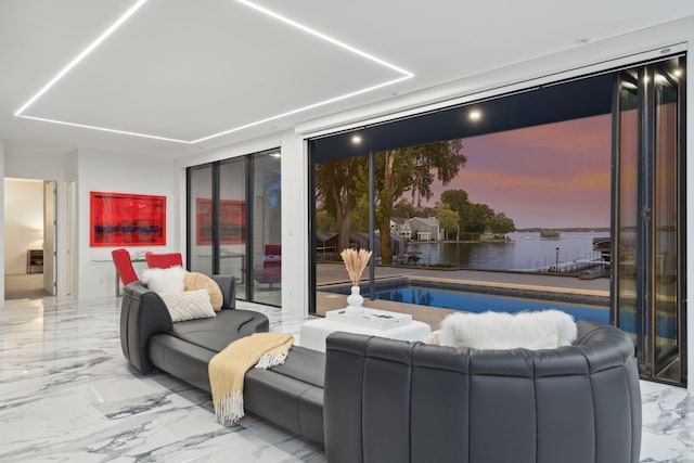 1225 Shoreline Dr, Orono, MN 55391 - living area with marble tiled flooring and a water view