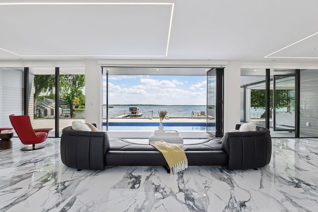 1225 Shoreline Dr, Orono, MN 55391 - living room with floor to ceiling windows, a water view, and marble tiled flooring