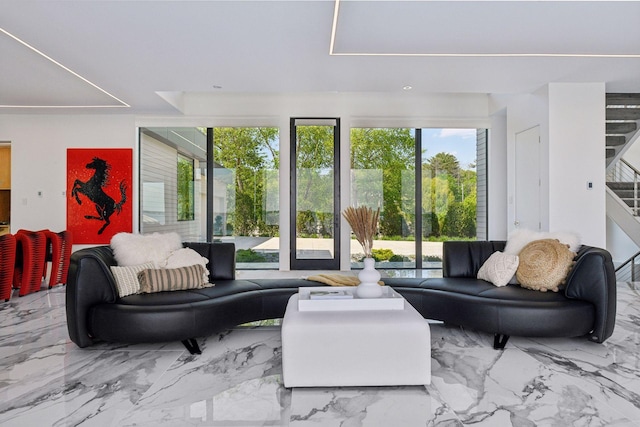 1225 Shoreline Dr, Orono, MN 55391 - living room featuring plenty of natural light, stairs, and marble finish floors