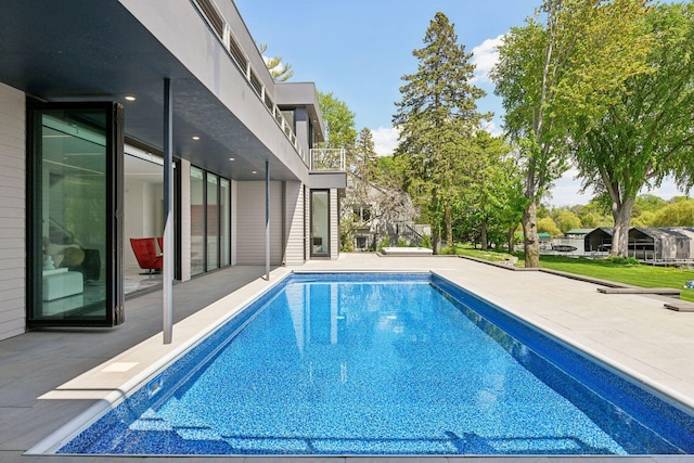 1225 Shoreline Dr, Orono, MN 55391 - swimming pool featuring a patio area