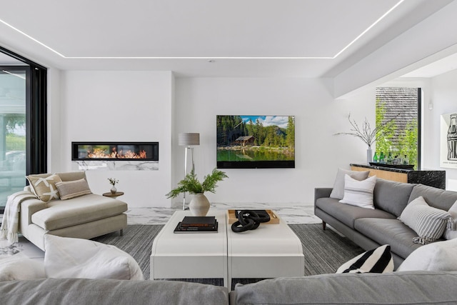 1225 Shoreline Dr, Orono, MN 55391 - living area featuring a glass covered fireplace