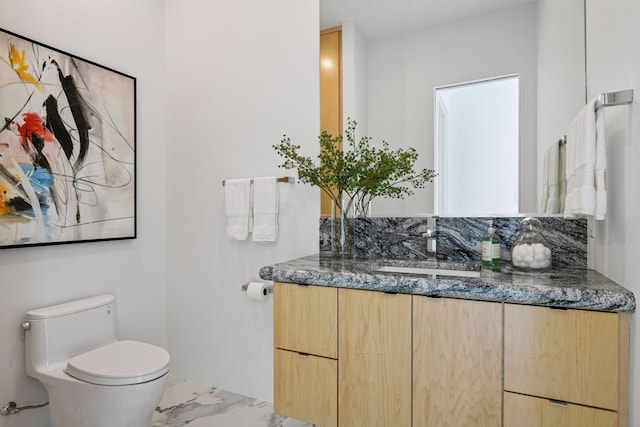 1225 Shoreline Dr, Orono, MN 55391 - bathroom with marble finish flooring, toilet, and vanity
