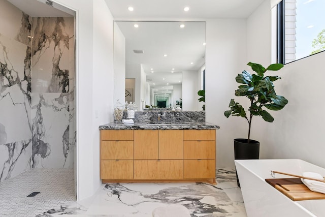 1225 Shoreline Dr, Orono, MN 55391 - full bathroom featuring recessed lighting, marble tiled flooring, a marble finish shower, vanity, and a soaking tub