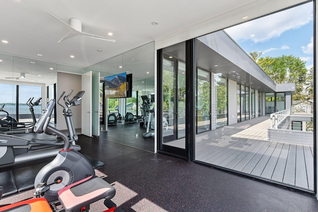 1225 Shoreline Dr, Orono, MN 55391 - gym featuring expansive windows, ceiling fan, and recessed lighting
