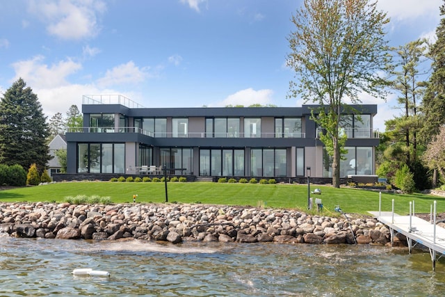 1225 Shoreline Dr, Orono, MN 55391 - rear view of house featuring a balcony, a yard, and a water view