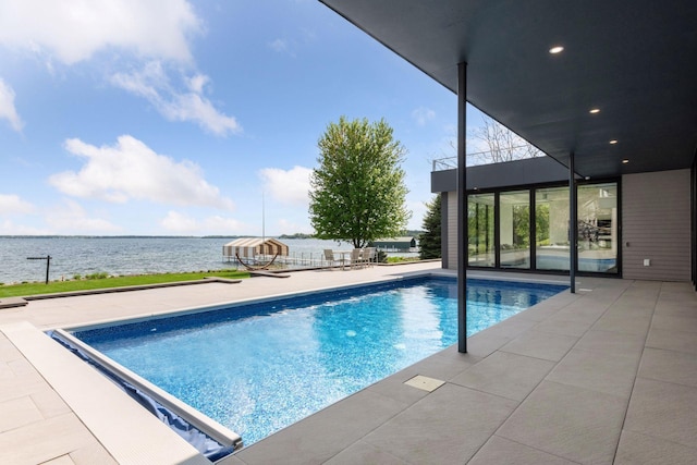 1225 Shoreline Dr, Orono, MN 55391 - outdoor pool featuring a water view and a patio