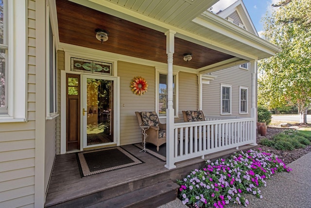 doorway to property with covered porch