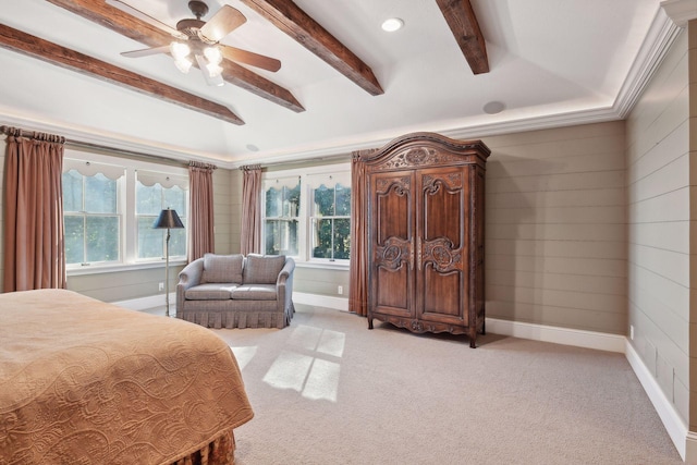 carpeted bedroom with beam ceiling and ceiling fan