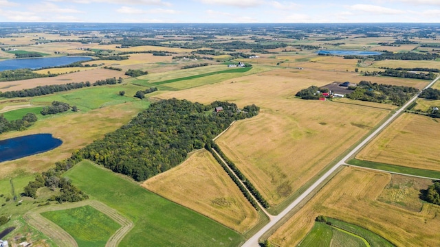 aerial view featuring a water view and a rural view