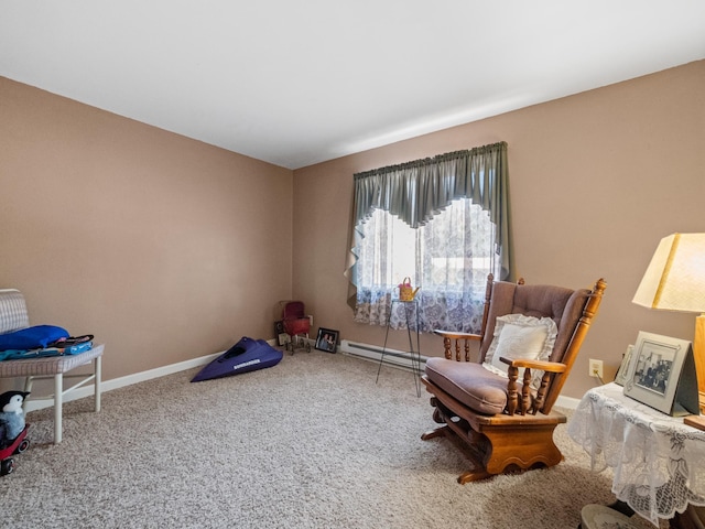 sitting room with carpet flooring and baseboard heating